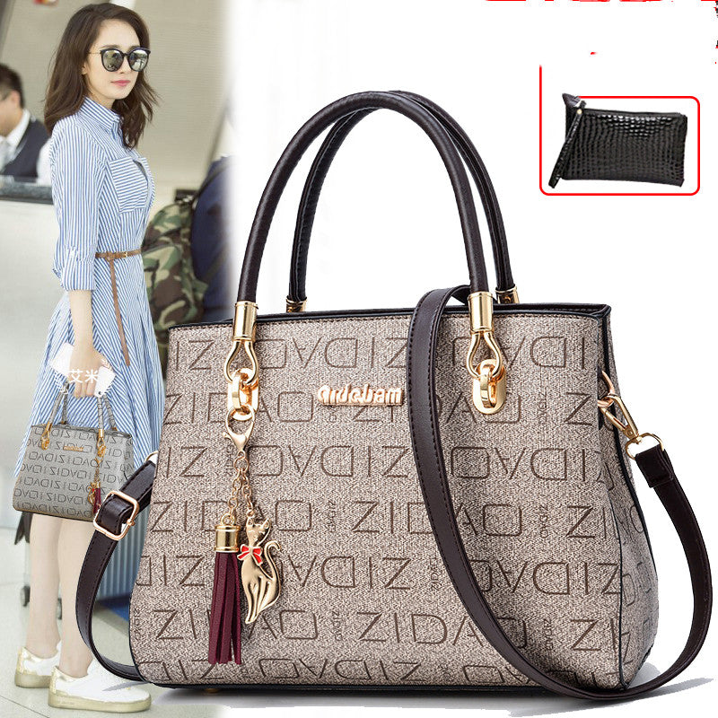Sarah Express Printed Cat Charm Messenger Handbag