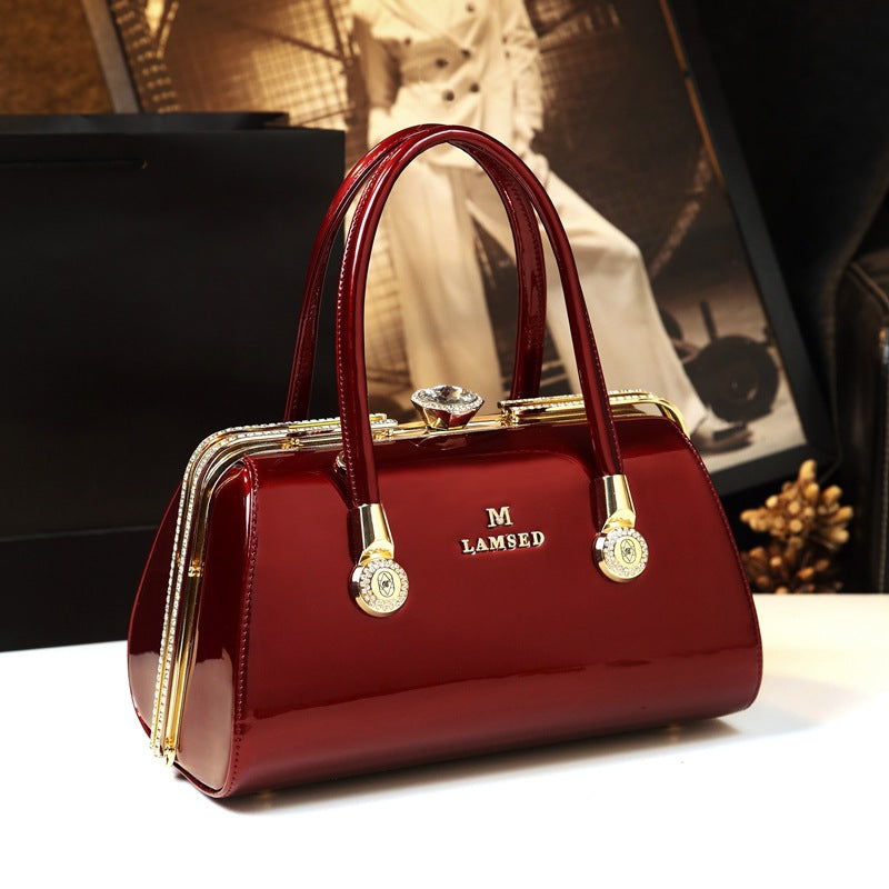Sarah Express Structured Patent Leather Pillow Handbag Wine Red