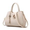 Sarah Express Structured Tassel Top-Handle Travel Bag Beige