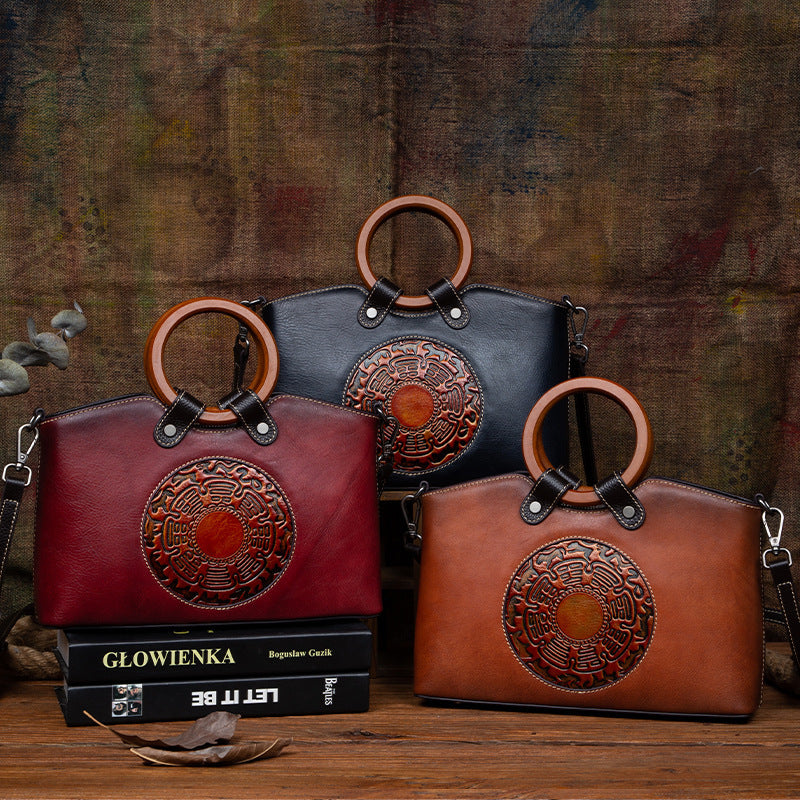 Sarah Express Vintage Embossed Leather Messenger Handbag