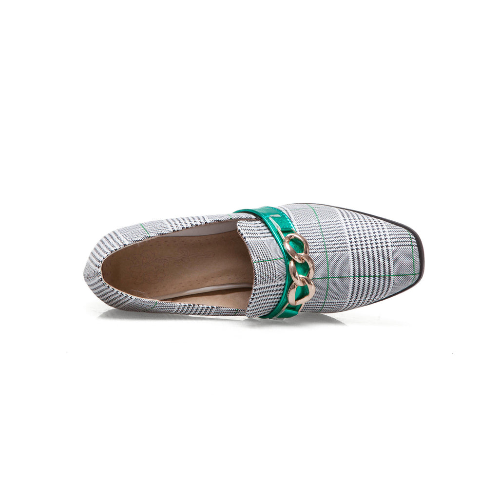 Top view of plaid block heel pumps with green chain