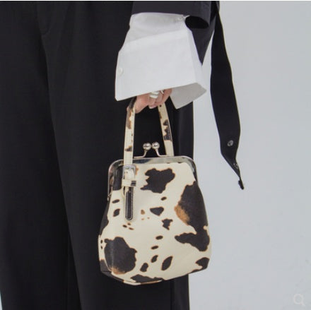 Sarah Express Cow Print Clip Top Messenger Bag