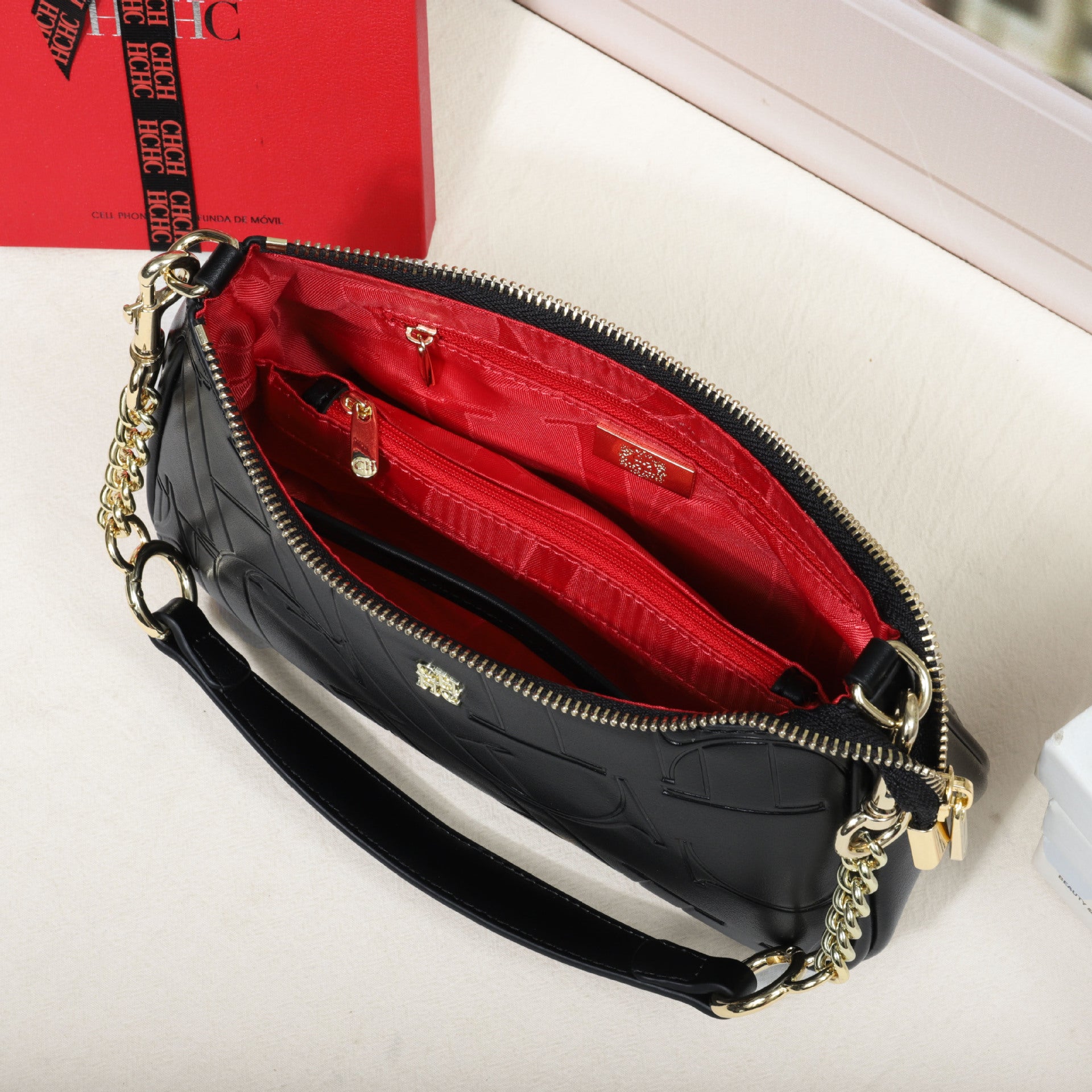 Sarah Express Embossed Letter Dumpling Crossbody Bag