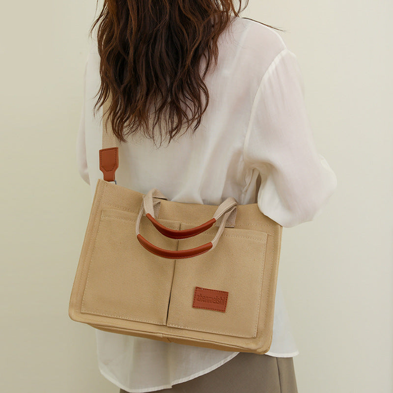 Sarah Express Canvas Multi-Pocket Tote and Crossbody Bag