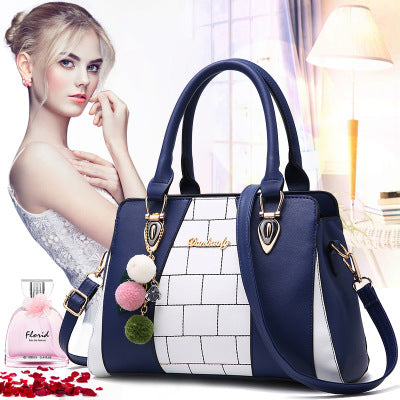 Sarah Express Structured Two-Tone Handbag with Pom-Pom Charm