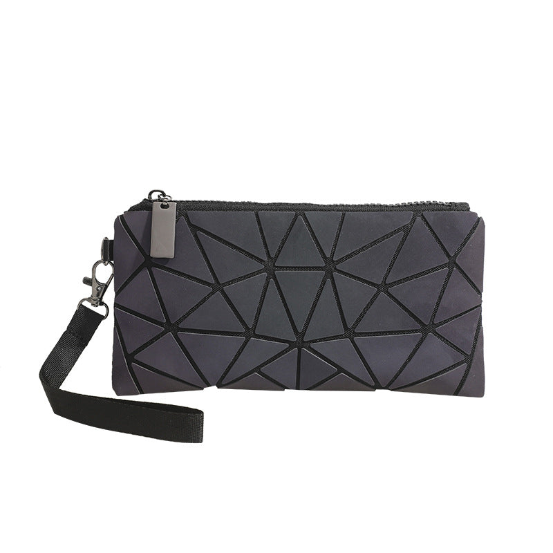 Sarah Express Geometric Patchwork Glow-in-the-Dark Clutch Bag